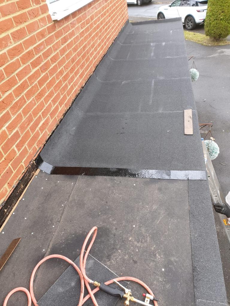 Flat roof installation by Maybach Roofing